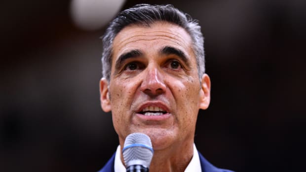 Former Villanova coach Jay Wright speaks before a game.